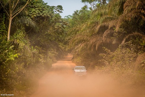Nothing but dust on the dirt road towards the cocoa farm Dusty Road